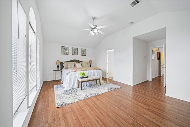 13814 Fort Nelson Dr, Houston, TX 77083 - bedroom with vaulted ceiling, wood finished floors, ceiling fan, and baseboards