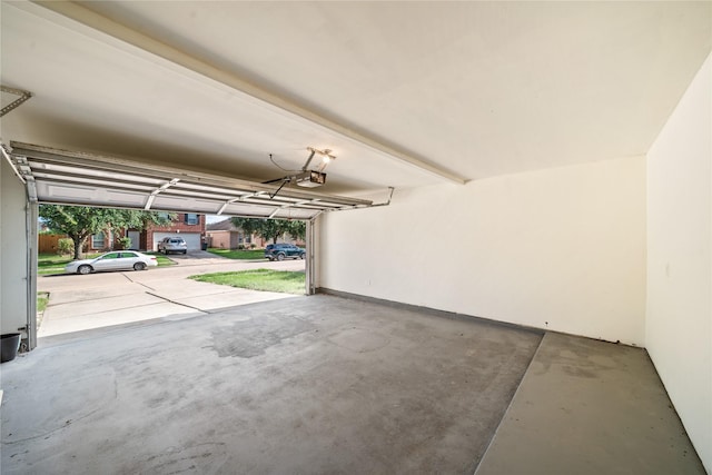 13814 Fort Nelson Dr, Houston, TX 77083 - garage featuring a garage door opener
