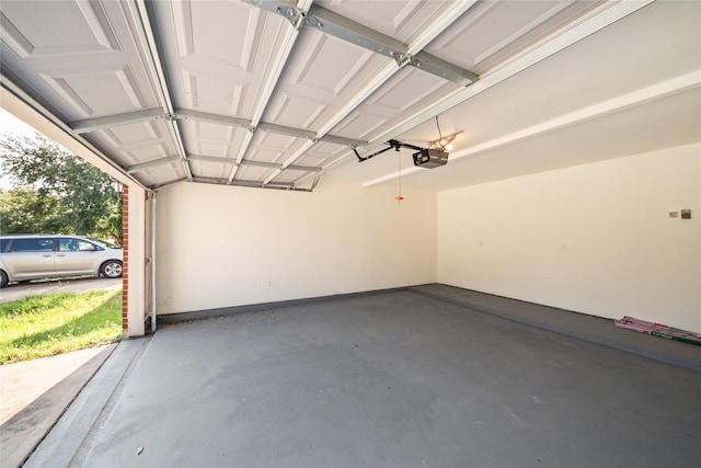 13814 Fort Nelson Dr, Houston, TX 77083 - garage featuring a garage door opener