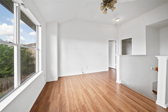 13814 Fort Nelson Dr, Houston, TX 77083 - spare room featuring ceiling fan, wood finished floors, and vaulted ceiling