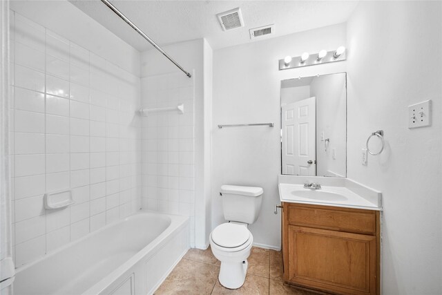 13814 Fort Nelson Dr, Houston, TX 77083 - bathroom with vanity, toilet, tile patterned flooring, and  shower combination