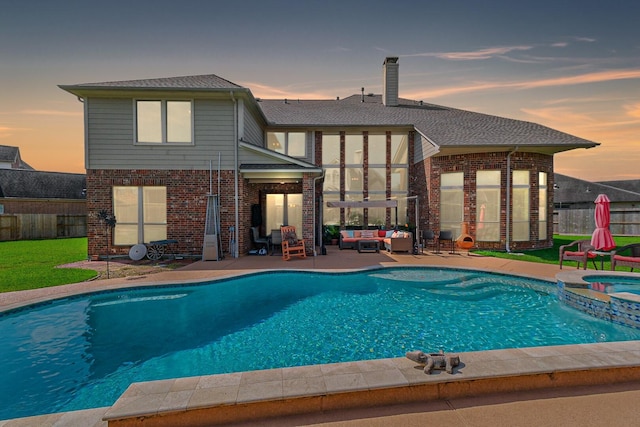 2402 Chesley Park Ct, Katy, TX 77494 - view of swimming pool with an outdoor hangout area, a patio, a fenced backyard, and a pool with connected hot tub