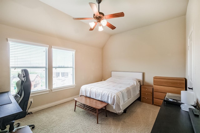 2402 Chesley Park Ct, Katy, TX 77494 - bedroom featuring an office area, vaulted ceiling, light colored carpet, and a ceiling fan