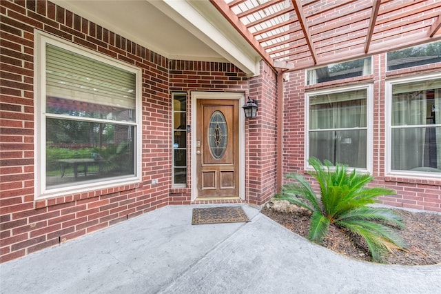 8034 High Hollow Ln, Houston, TX 77070 - entrance to property featuring brick siding and a pergola