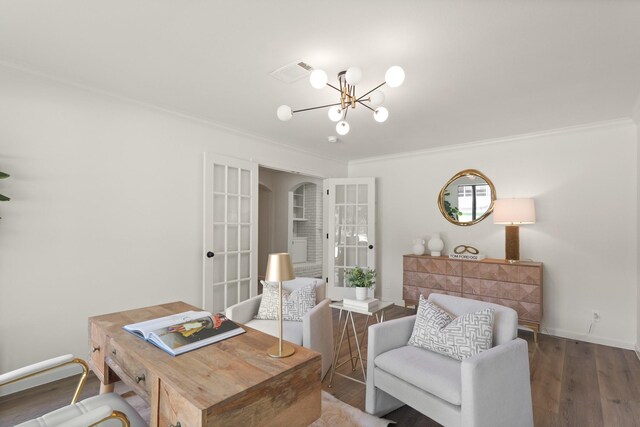 5302 Wigton Dr, Houston, TX 77096 - office space featuring ornamental molding, a chandelier, wood finished floors, arched walkways, and french doors