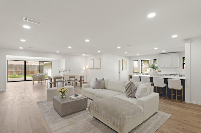5302 Wigton Dr, Houston, TX 77096 - living area featuring recessed lighting and light wood-style floors
