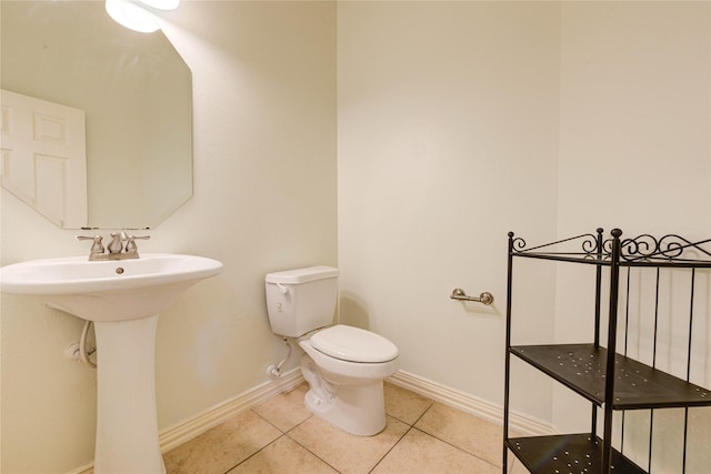 7115 Laguna Villas, Houston, TX 77036 - bathroom with tile patterned flooring and toilet