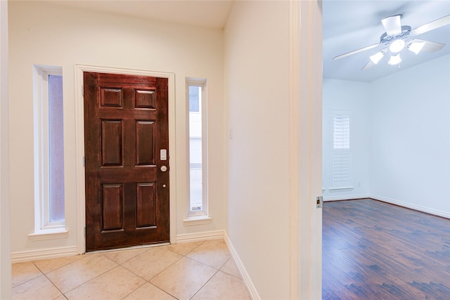 7115 Laguna Villas, Houston, TX 77036 - foyer entrance featuring ceiling fan and tile patterned floors