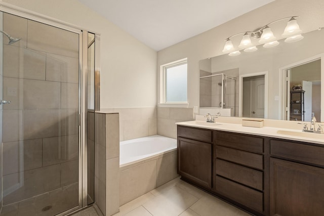 19110 Macallan Ln, Katy, TX 77449 - full bath with a stall shower, double vanity, a bath, and tile patterned flooring