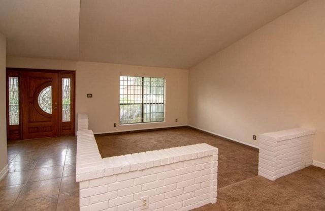 5523 Fair Forest Dr, Houston, TX 77088 - tiled entryway featuring lofted ceiling and carpet flooring