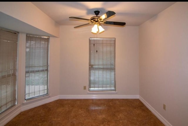 5523 Fair Forest Dr, Houston, TX 77088 - spare room with a ceiling fan and tile patterned flooring