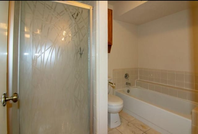 5523 Fair Forest Dr, Houston, TX 77088 - full bath featuring tile patterned flooring, a shower stall, and a bath