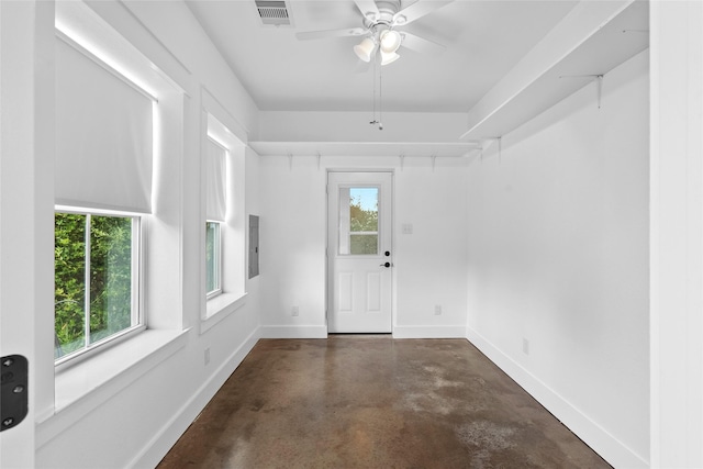 25460 W Fm 1097th Rd, Montgomery, TX 77356 - entryway featuring concrete floors, a ceiling fan, and electric panel
