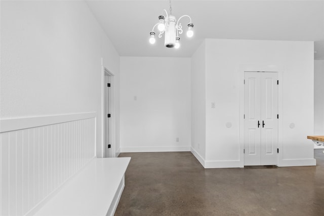25460 W Fm 1097th Rd, Montgomery, TX 77356 - unfurnished room featuring concrete floors and a chandelier