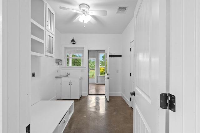 25460 W Fm 1097th Rd, Montgomery, TX 77356 - laundry area featuring cabinet space, ceiling fan, and electric dryer hookup