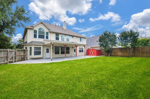 16210 S Temple Dr, Houston, TX 77095 - back of property with a patio area, a storage shed, a fenced backyard, and a chimney