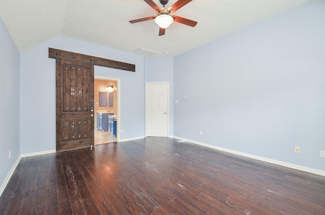 16210 S Temple Dr, Houston, TX 77095 - empty room featuring ceiling fan, hardwood / wood-style flooring, a barn door, and lofted ceiling