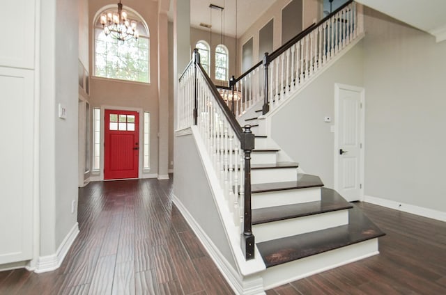 16210 S Temple Dr, Houston, TX 77095 - entrance foyer with a chandelier, a towering ceiling, stairs, and dark wood-style flooring