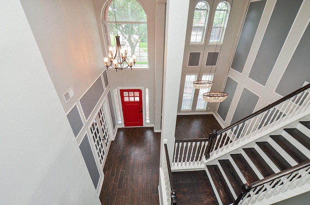 16210 S Temple Dr, Houston, TX 77095 - foyer entrance with a towering ceiling, a chandelier, wood finished floors, and stairs