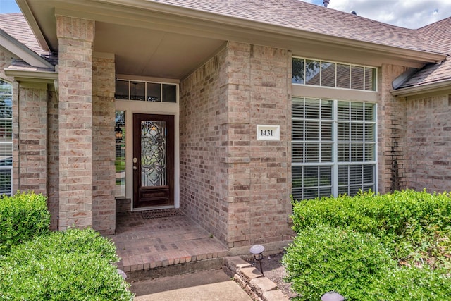 1431 Hidden Terrace Dr, Sugar Land, TX 77479 - property entrance with a shingled roof and brick siding