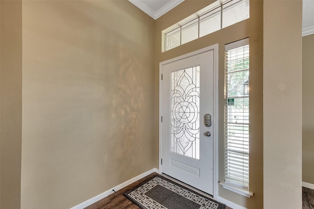 1431 Hidden Terrace Dr, Sugar Land, TX 77479 - entryway with ornamental molding and dark wood-style flooring