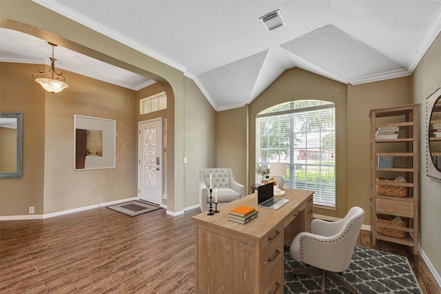 1431 Hidden Terrace Dr, Sugar Land, TX 77479 - office area featuring dark wood-type flooring, vaulted ceiling, arched walkways, a textured ceiling, and crown molding