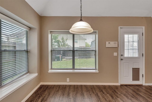 1431 Hidden Terrace Dr, Sugar Land, TX 77479 - unfurnished dining area with plenty of natural light, dark wood finished floors, and vaulted ceiling