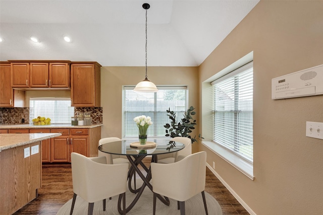 1431 Hidden Terrace Dr, Sugar Land, TX 77479 - dining space with lofted ceiling, dark wood-type flooring, and recessed lighting