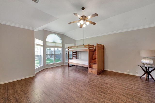 1431 Hidden Terrace Dr, Sugar Land, TX 77479 - unfurnished bedroom featuring vaulted ceiling, wood finished floors, and crown molding