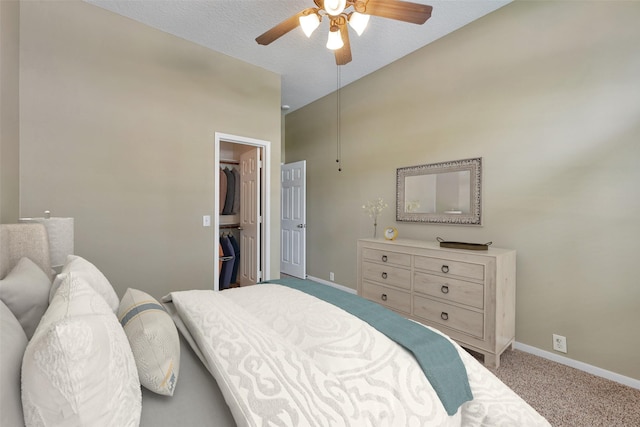 1431 Hidden Terrace Dr, Sugar Land, TX 77479 - bedroom with carpet flooring, lofted ceiling, a spacious closet, a ceiling fan, and a closet
