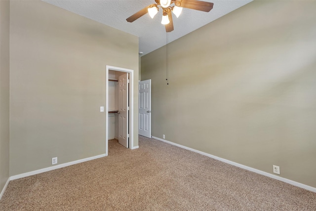 1431 Hidden Terrace Dr, Sugar Land, TX 77479 - unfurnished room featuring light colored carpet, ceiling fan, lofted ceiling, and a textured ceiling