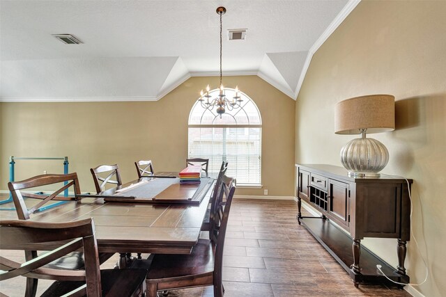 1431 Hidden Terrace Dr, Sugar Land, TX 77479 - dining room featuring a chandelier, vaulted ceiling, and ornamental molding