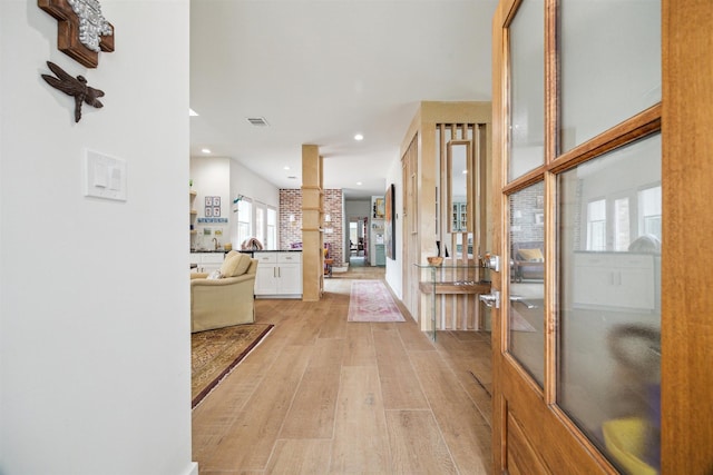 1215 Heathwood Dr, Houston, TX 77077 - entryway with light wood finished floors and recessed lighting
