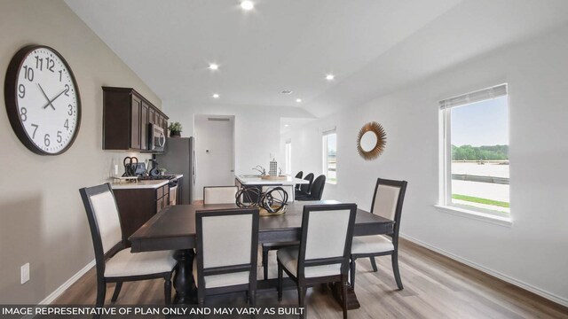 5446 Pinetree Crescent Ln, Spring, TX 77373 - dining room featuring light wood-type flooring and recessed lighting
