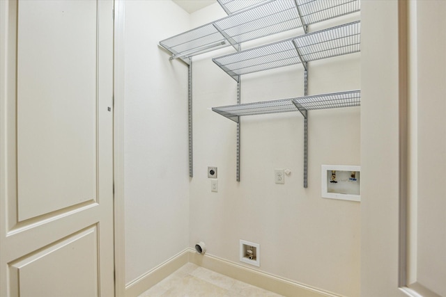 506 Knox St Unit A, Houston, TX 77007 - laundry room with electric dryer hookup, washer hookup, and tile patterned flooring