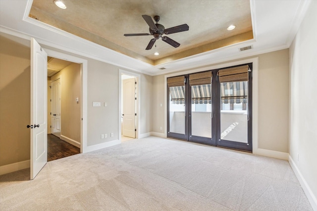 506 Knox St Unit A, Houston, TX 77007 - carpeted spare room with a tray ceiling, a ceiling fan, recessed lighting, and crown molding
