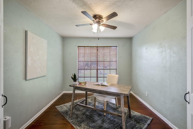 8415 Sparkling Springs Dr, Houston, TX 77095 - office area with ceiling fan, a textured wall, dark wood finished floors, and a textured ceiling