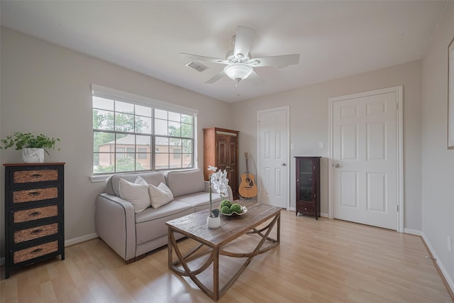 12214 Clearfork Dr, Houston, TX 77077 - living room featuring light wood-style flooring and a ceiling fan