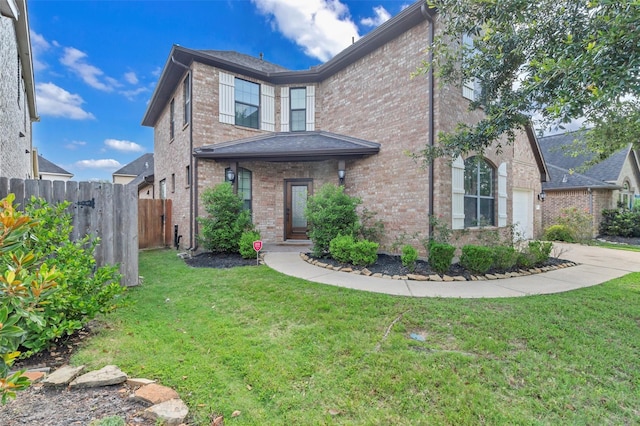 4511 Hickory Branch Ln, Sugar Land, TX 77479 - traditional home featuring brick siding and concrete driveway