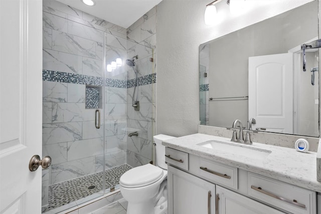 4511 Hickory Branch Ln, Sugar Land, TX 77479 - full bathroom featuring marble finish floors, vanity, a stall shower, and a textured wall