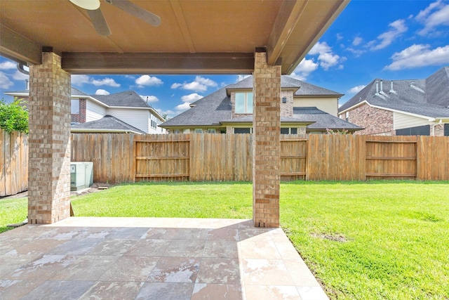 4511 Hickory Branch Ln, Sugar Land, TX 77479 - fenced backyard featuring a patio and ceiling fan