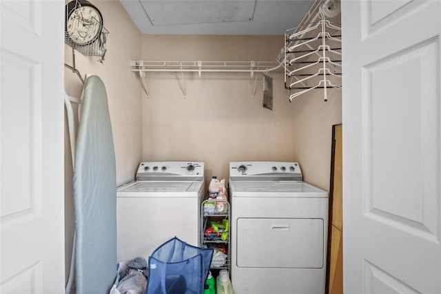 1906 Pasadena St, Houston, TX 77023 - washroom featuring washer and clothes dryer and attic access