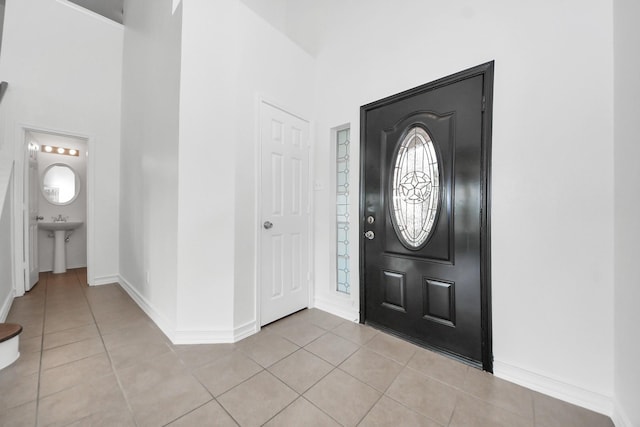 9226 Wichita Dr, La Porte, TX 77571 - entryway with light tile patterned floors and a high ceiling