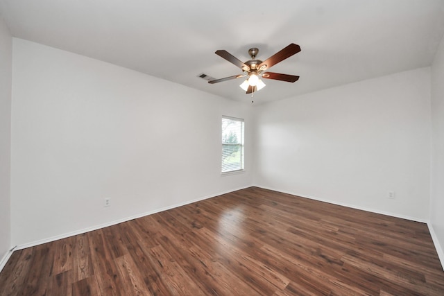 9226 Wichita Dr, La Porte, TX 77571 - unfurnished room featuring dark wood-type flooring and ceiling fan