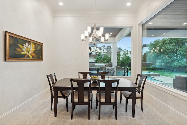 5201 Pine St, Bellaire, TX 77401 - dining area featuring a chandelier, ornamental molding, and recessed lighting