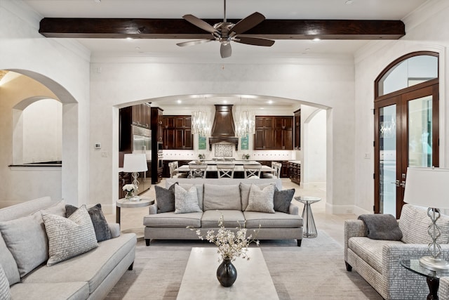 5201 Pine St, Bellaire, TX 77401 - living area featuring arched walkways, beam ceiling, a ceiling fan, ornamental molding, and recessed lighting