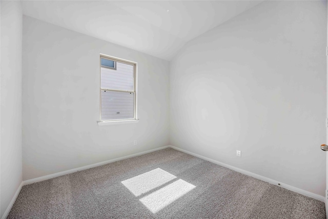 10919 Independence Rd, Cleveland, TX 77328 - carpeted spare room with baseboards and lofted ceiling
