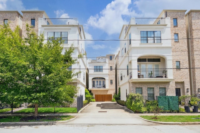 6018 Maxie St Unit B, Houston, TX 77007 - view of front of home with brick siding and stucco siding