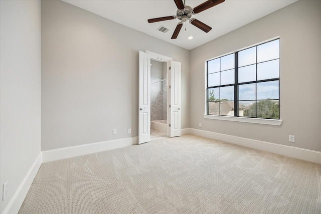 6018 Maxie St Unit B, Houston, TX 77007 - unfurnished bedroom featuring light carpet, recessed lighting, connected bathroom, and ceiling fan