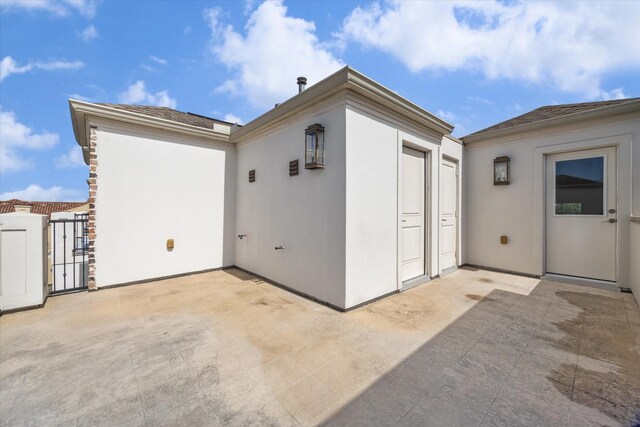 6018 Maxie St Unit B, Houston, TX 77007 - back of property with a patio area and stucco siding